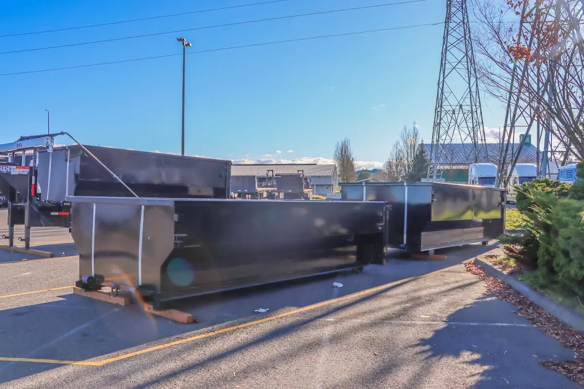Roll-off dumpster ready for waste disposal at job site for Construction Dumpster Rental in Rockport